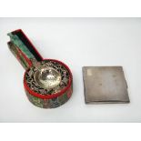A Chinese tea strainer, the border pierced and embossed with leaves,