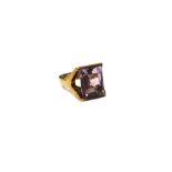 A 9ct gold and rectangular cut amethyst single stone ring, London 1966, ring size O, gross weight 7.
