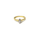 An 18ct gold and diamond ring, the marquise cut diamond weighing approximately 0.