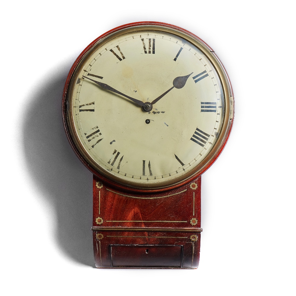 A Regency mahogany and brass-inlaid drop-dial timepiece The 12in.