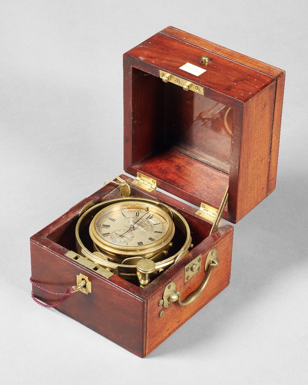 A small mahogany cased two-day marine chronometer By Parkinson & Frodsham, London, No.