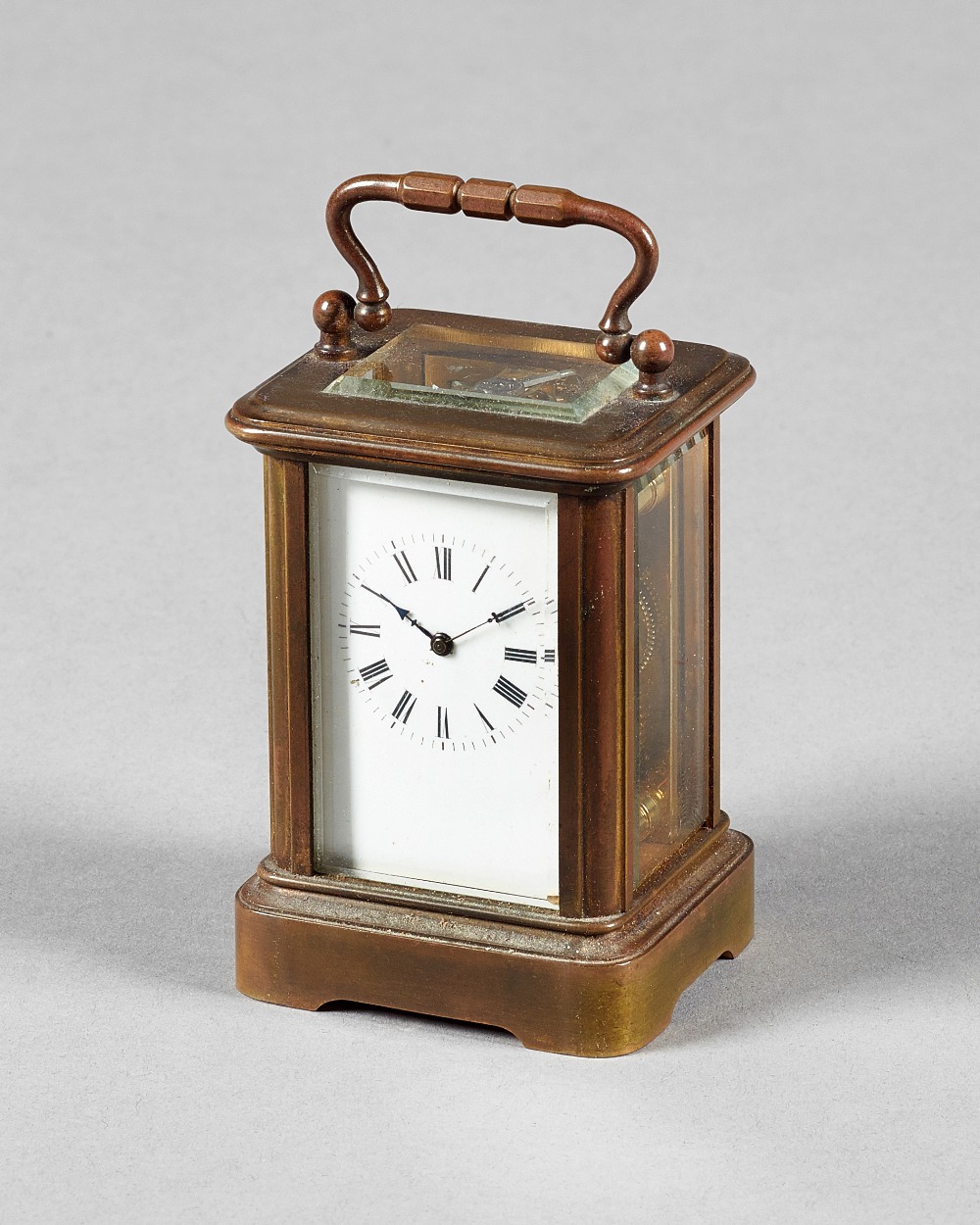 A French miniature brass carriage timepiece Circa 1890 In a Corniche case,