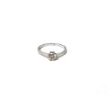 A solitaire diamond ring, the round brilliant cut diamond weighing approximately 0.