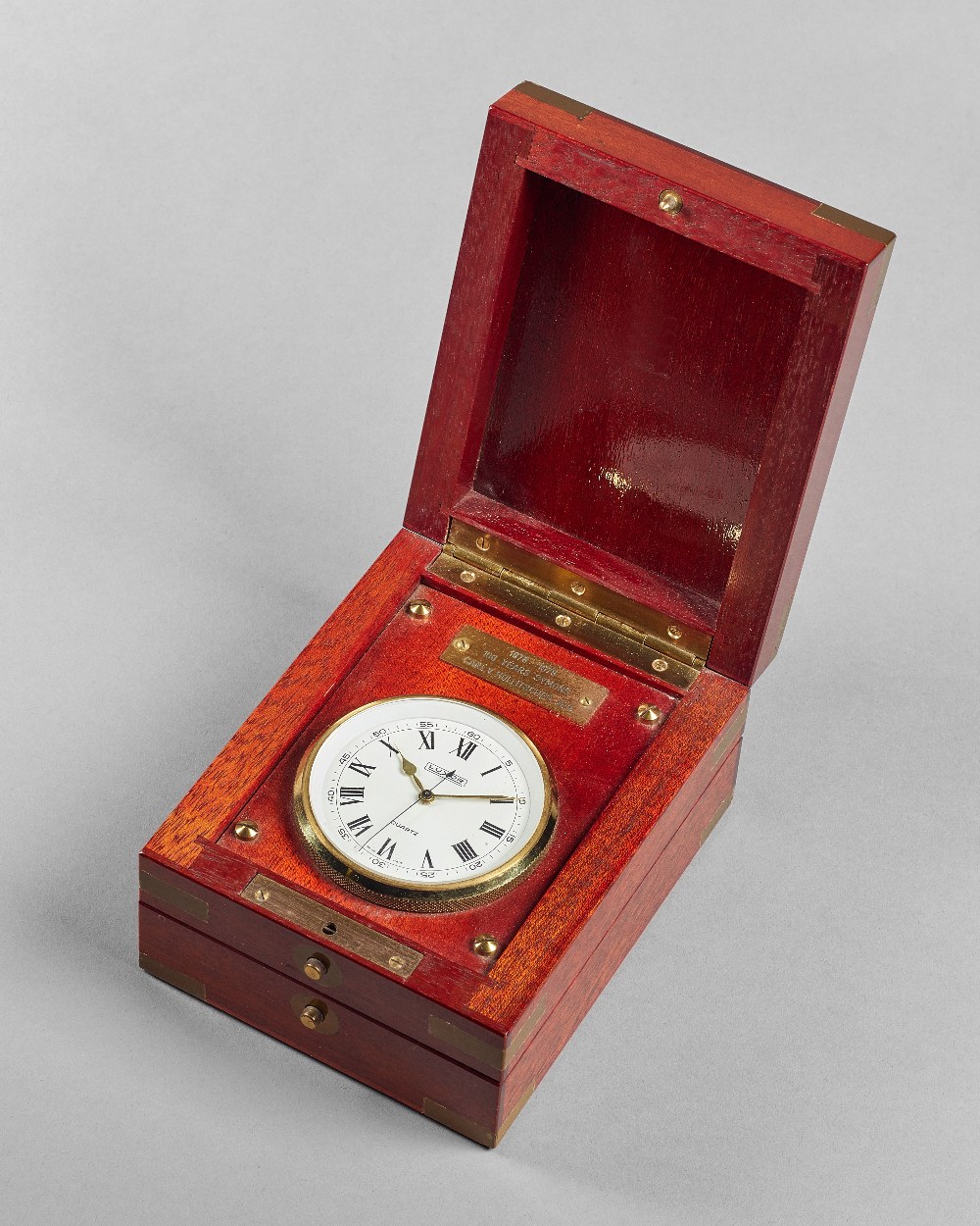 A Swiss brass-bound mahogany quartz deck watch Signed Luxor, No.