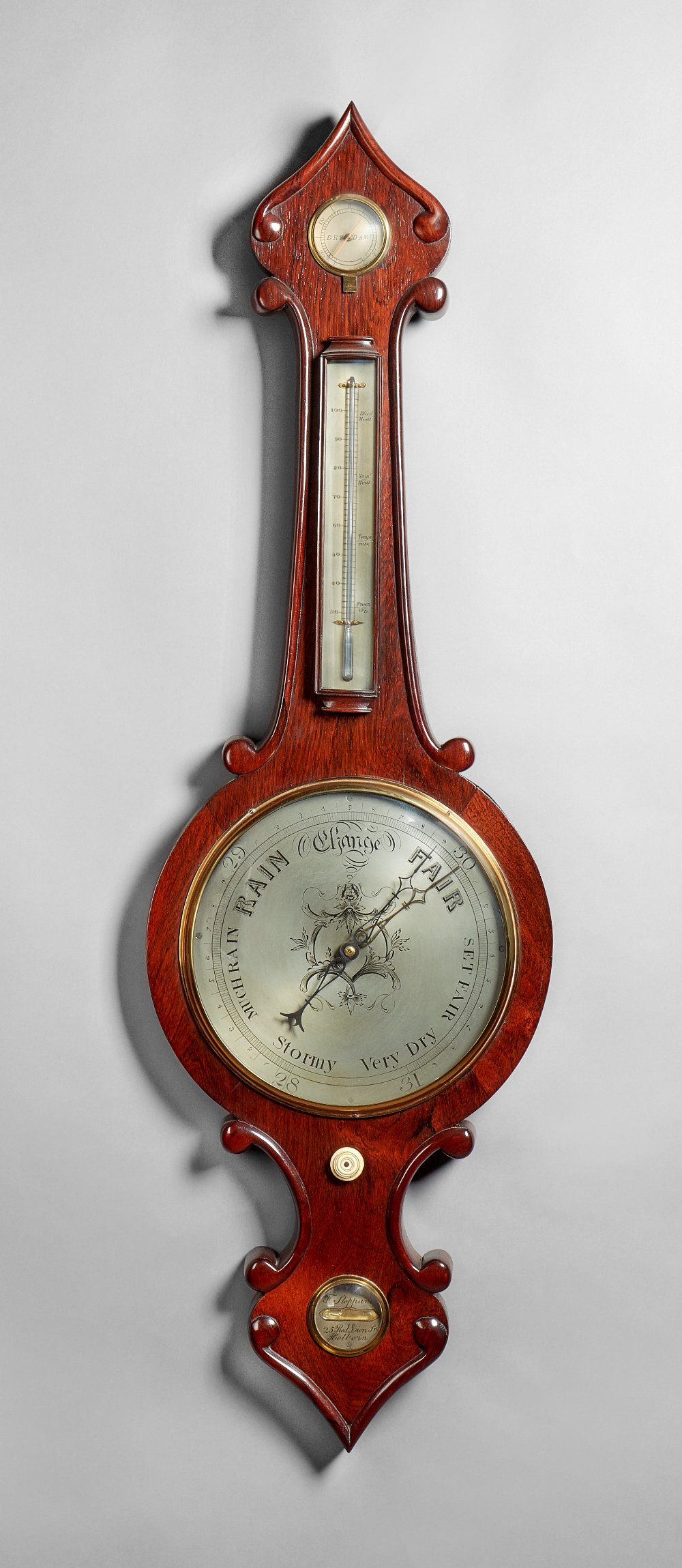 A Victorian rosewood wheel barometer By F.