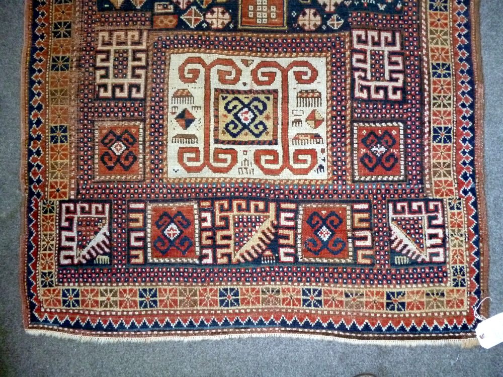 A Karachor Kazak rug, Caucasian, the indigo field with two ivory squares, a madder central cross, - Image 3 of 11