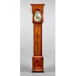 A mahogany longcase clock of small size, Circa 1930 The hood with a stepped rectangular pediment,