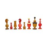 A 'Lyon' pattern fruitwood and stained ivory chess set, late 19th century,