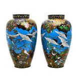 A pair of Japanese cloisonné vases, Meiji period, of slender ovoid form,