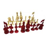 An English stained bone chess set late 19th/early 20th century, of turned form (king 10.