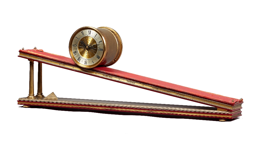 A brass, red perspex and leather-lined inclined plane timepiece Dent, London, by Andrew Fell,