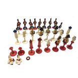 An unusual French stained and painted part bone chess set, late 19th century,