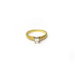 An 18ct gold and diamond solitaire ring, the Millennium cut diamond weighing approximately 0.