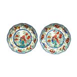 A pair of small Japanese Kakiemon dishes, Edo period, with foliate rims,