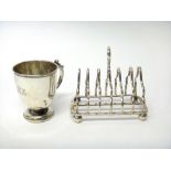 Silver, comprising; a seven bar toast rack, having a loop shaped handle,