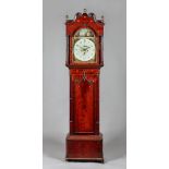 A Regency mahogany and marquetry inlaid longcase clock The movement by Davies,