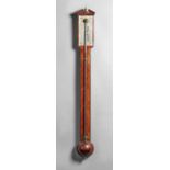 A George III mahogany stick barometer By Harris,
