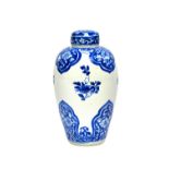 A Chinese blue and white vase and cover, Kangxi, of slender ovoid form,