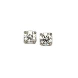 A pair of Tiffany & Co platinum and diamond set single stone ear studs,