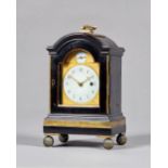 An interesting George III ebonised and brass-mounted timepiece Retailed by Haley & Milner, London,