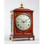 A Regency brass-mounted mahogany bracket clock Circa 1810 The chamfer top case surmounted by a