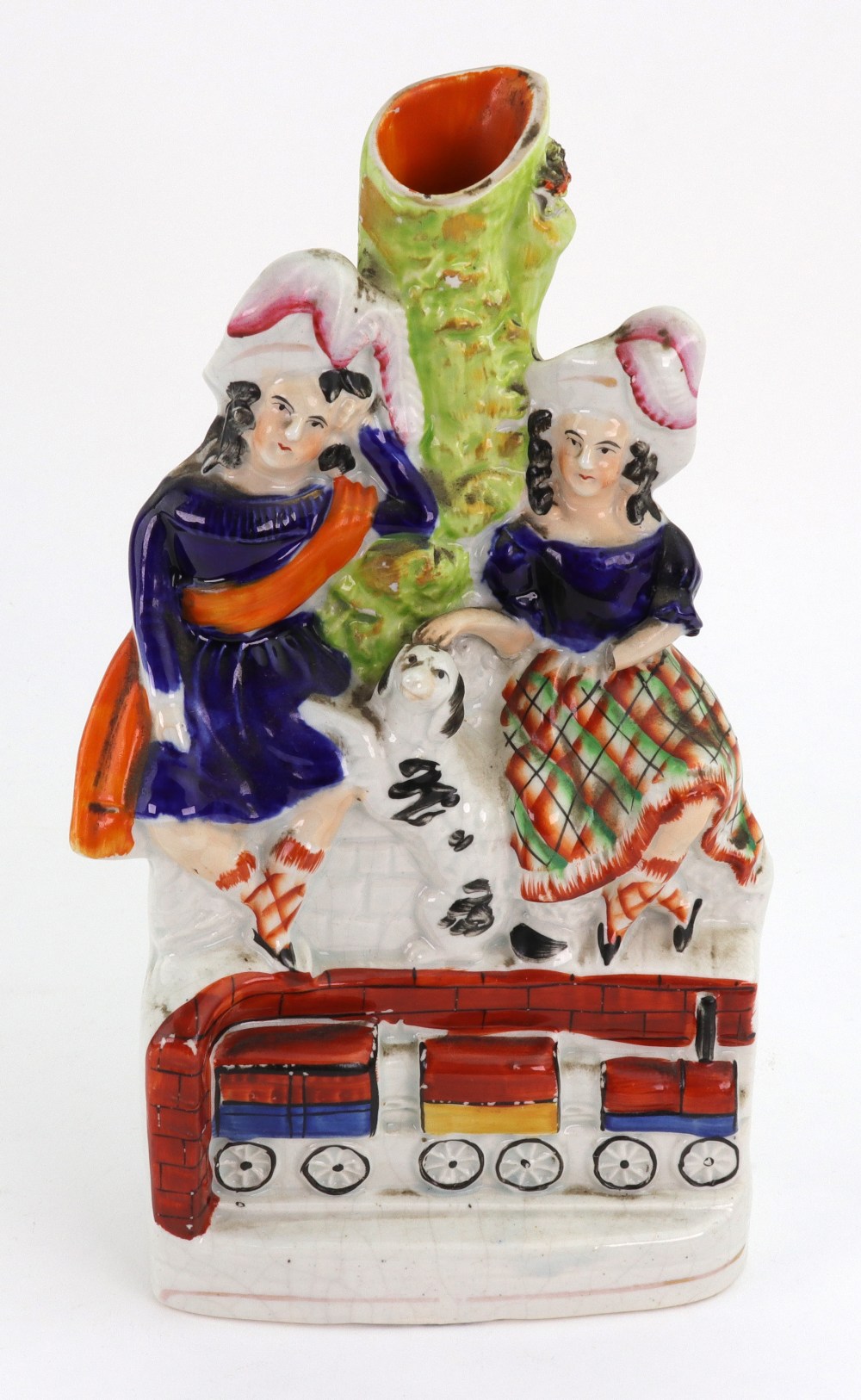 A Staffordshire pottery group of two chi