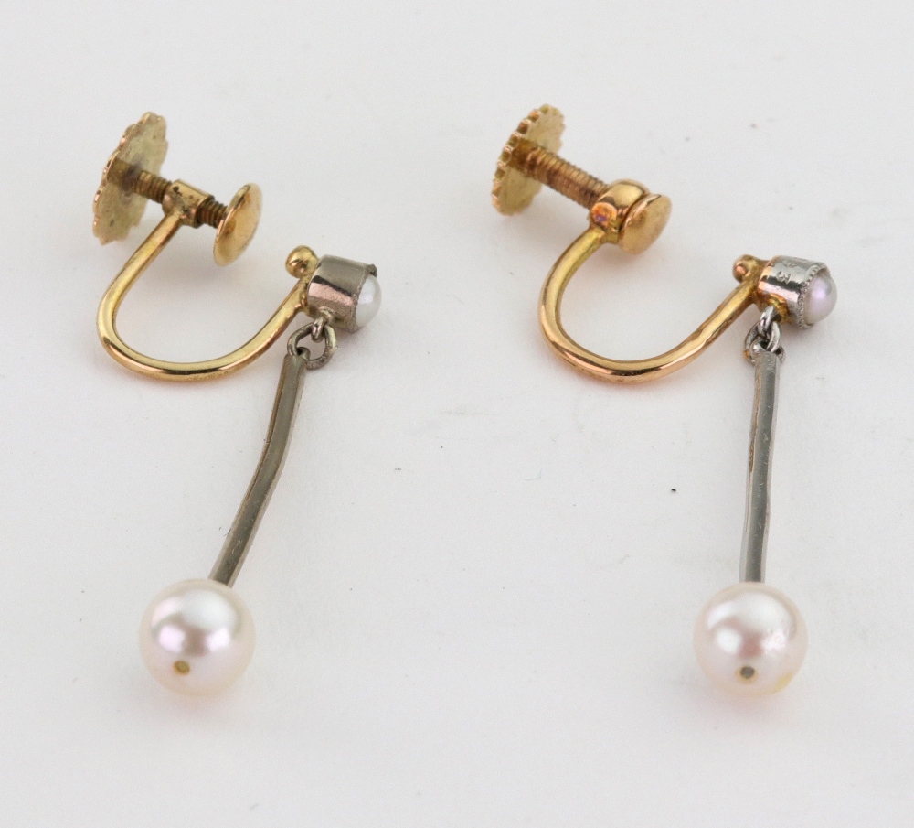A pair of gold, white metal and pearl pe
