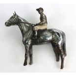 A chromium plated racehorse with jockey