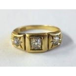 A late Victorian gold and diamond three