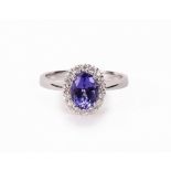 An 18ct white gold, tanzanite and diamon