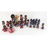 Eleven plastic Robertson Golly Football figures, and other resin, plastic Golliwogg figures,