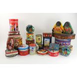 A collection of vintage and modern tins and packaging each featuring a Golliwogg as it's main