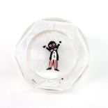 A John Deacon faceted glass paperweight with a central traditionally dressed Golliwogg,