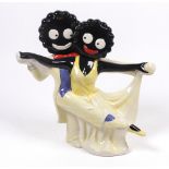 A Carlton Ware teapot and cover 'Golliwogg dancers', probably after a design by Francis Joseph',