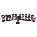 A collection of five Carltonware Golly bandsman, keyboard player artist proof, 20cm,