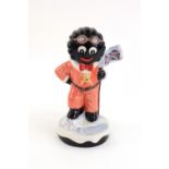 A Carlton Ware trial figure 'Golliwogg Mountaineer', probably after a design by Francis Joseph,