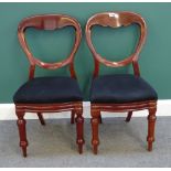 A set of eight Victorian mahogany framed balloon back dining chairs,