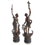 A pair of French bronzed spelter figures, 'Le Commerce' and 'L'Industrie',