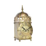 A brass cased lantern clock, late 19th century, the dial detailed 'Thos Moore Ipswich',