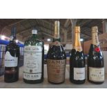 Twelve bottles of mixed port and spirits, comprising; a 1976 Fonseca vintage port,