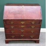 A George III mahogany bureau, the fall enclosing a fitted interior,