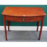 A George III mahogany bowfront single drawer side table, on tapering square supports,