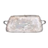 A silver twin handled shaped rectangular tray,