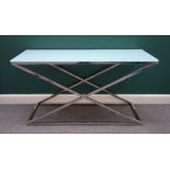 Eichholtz; a late 20th century chrome and glass console table with 'X' frame supports,