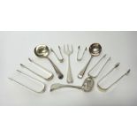 Silver flatware, comprising; two sauce ladles, London 1800 and 1786, a sugar sifting spoon,
