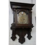 An English stained pine wall clock, late 19th century,