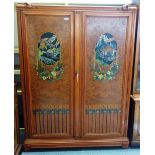 An early 20th century North European satinwood and burr elm two door side cabinet,