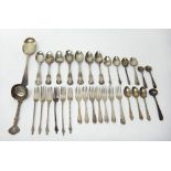 Silver flatware, comprising; a set of six pastry forks, Birmingham 1946, a sugar sifting spoon,