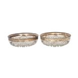 A pair of Tiffany & Co Sterling silver mounted circular faceted glass bowls, detailed Tiffany & Co,