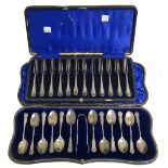Twelve silver bead edged Old English pattern Sterling pastry forks, differing dates,